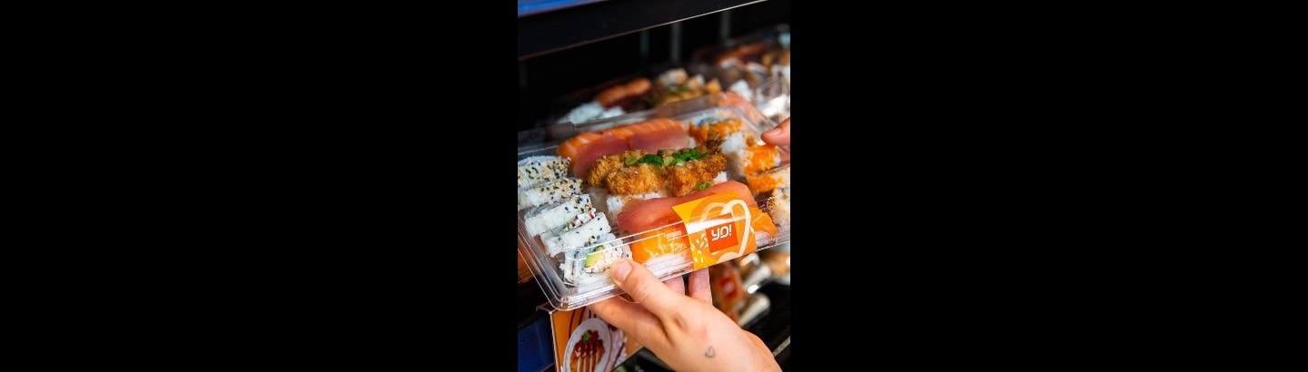 YO! sushi franchise partners at a kiosk